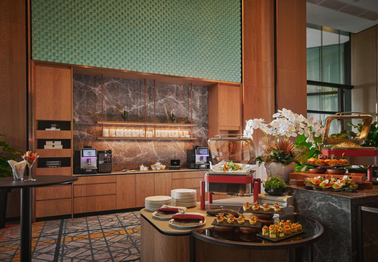 峇六拜 Amari Spice Penang酒店 外观 照片 The Coffee Bar